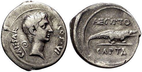 Монета, посветена на битката при Акций, състояла се в 31 г.